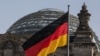 GERMANY -- The German flag flys outside the Reichstag, the building which houses the Bundestag (the German lower house of parliament) in Berlin, February 24, 2021