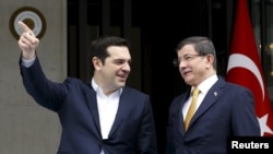 Ahmet Davutoglu və Alexis Tsipras 